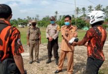 ORMAS PEMUDA PANCASILA BANDAR SRIBHAWONO TERUS BERGERAK BERSAMA MASYARAKAT DAN PEMERINTAH MENCEGAH PENYEBARAN COVID 19