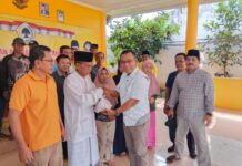 Golkar Lamsel Berbagi Daging Kurban Dua Ekor Sapi